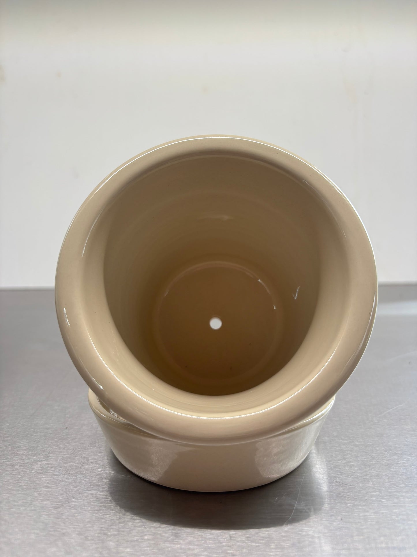 Top view of Bergs Ceramic Pots, 10x11 cm, highlighting the interior drainage hole and smooth glazed finish, suitable for indoor or outdoor use.